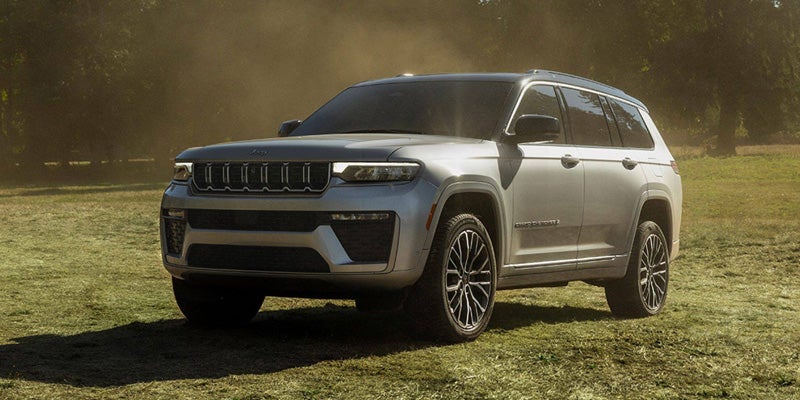 2026 Jeep Grand Cherokee in a scenic mountain setting