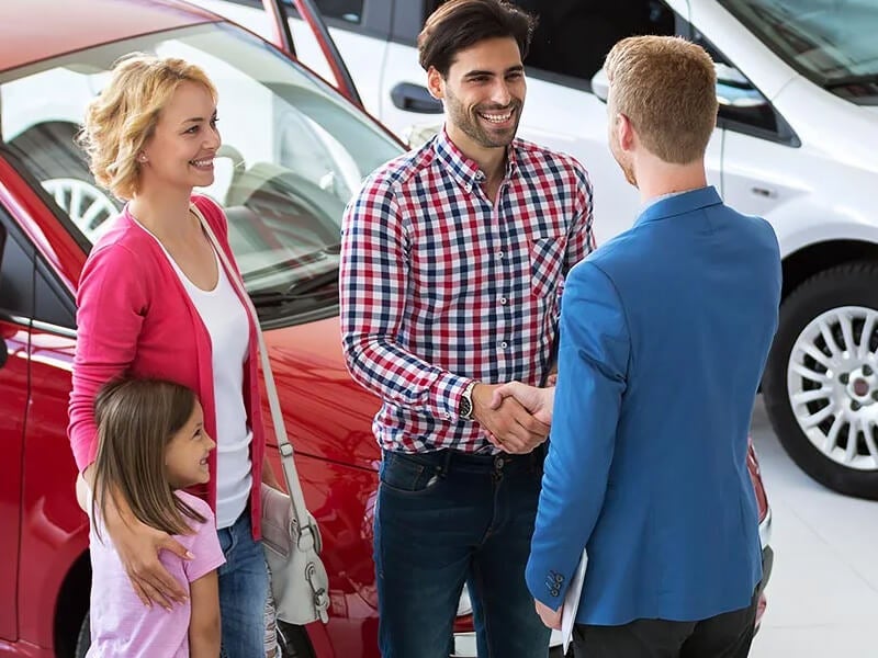 Cable Dahmer Chevy sales team member helping a customer